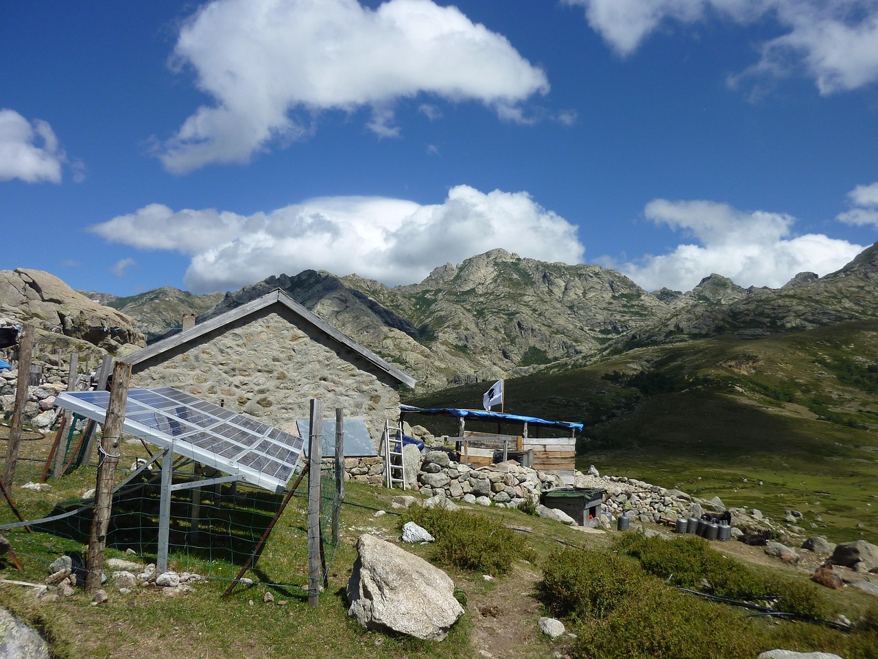 solar panel, solar, power, hut, rural, hilltop, mountain top, natural, alternative, renewable, wilderness, lifestyle, mountains, nature, sustainability, rocky, stones, home, building